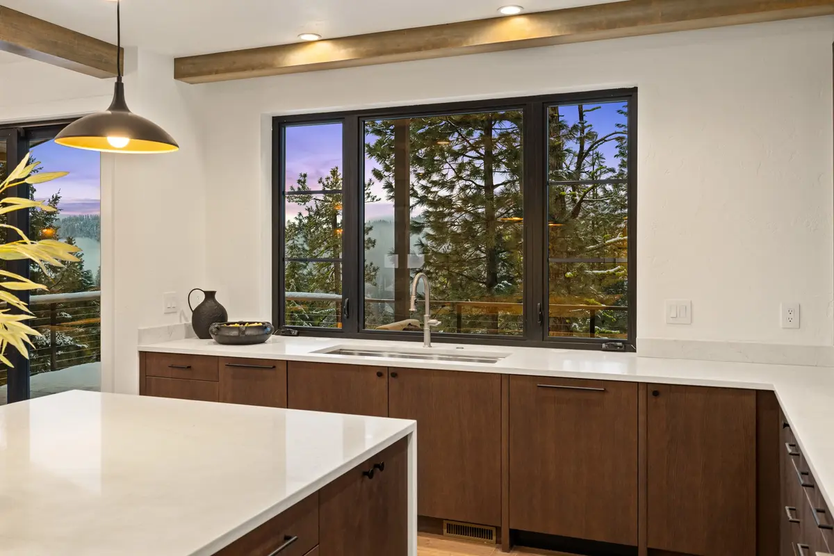 Base cabinetry installed above a finished floor with an even toe kick